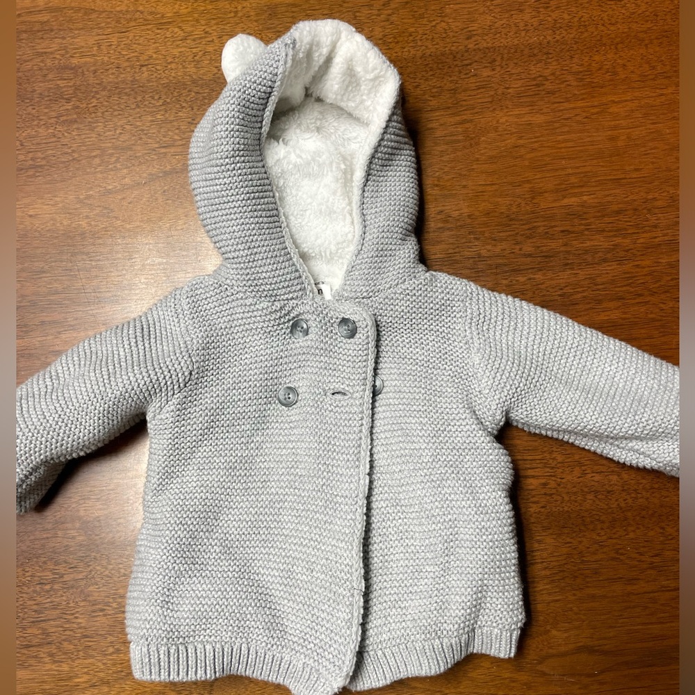 Super cozy knit fleece lined jacket with hood.